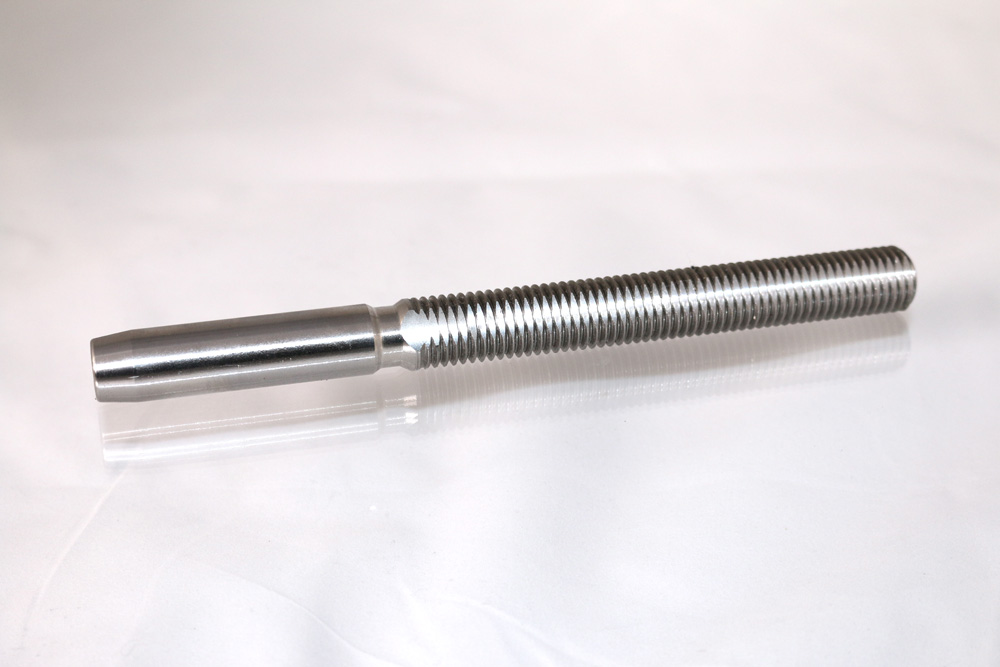 Threaded stainless steel stud with milled flats on threads